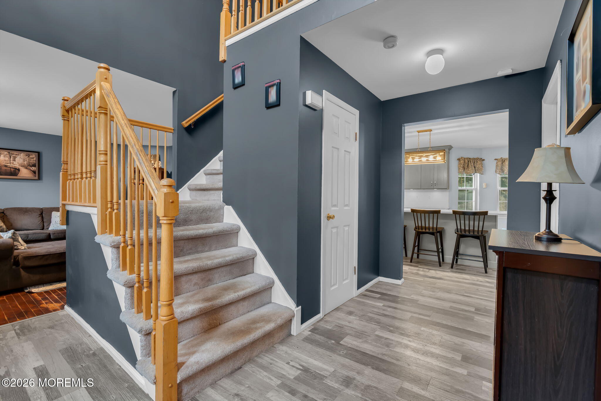 6 Candy Court Jackson, NJ 08527 - Photo 31 of 74 a view of a livingroom with furniture and staircase