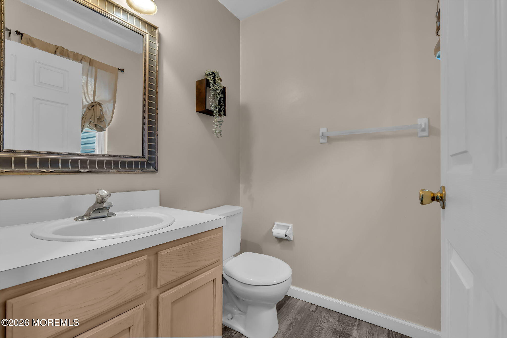 6 Candy Court Jackson, NJ 08527 - Photo 36 of 74 a bathroom with a toilet sink and mirror