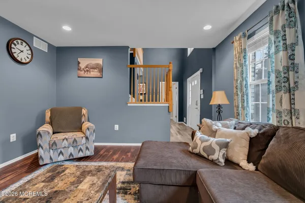 a kitchen with a table and chairs in it