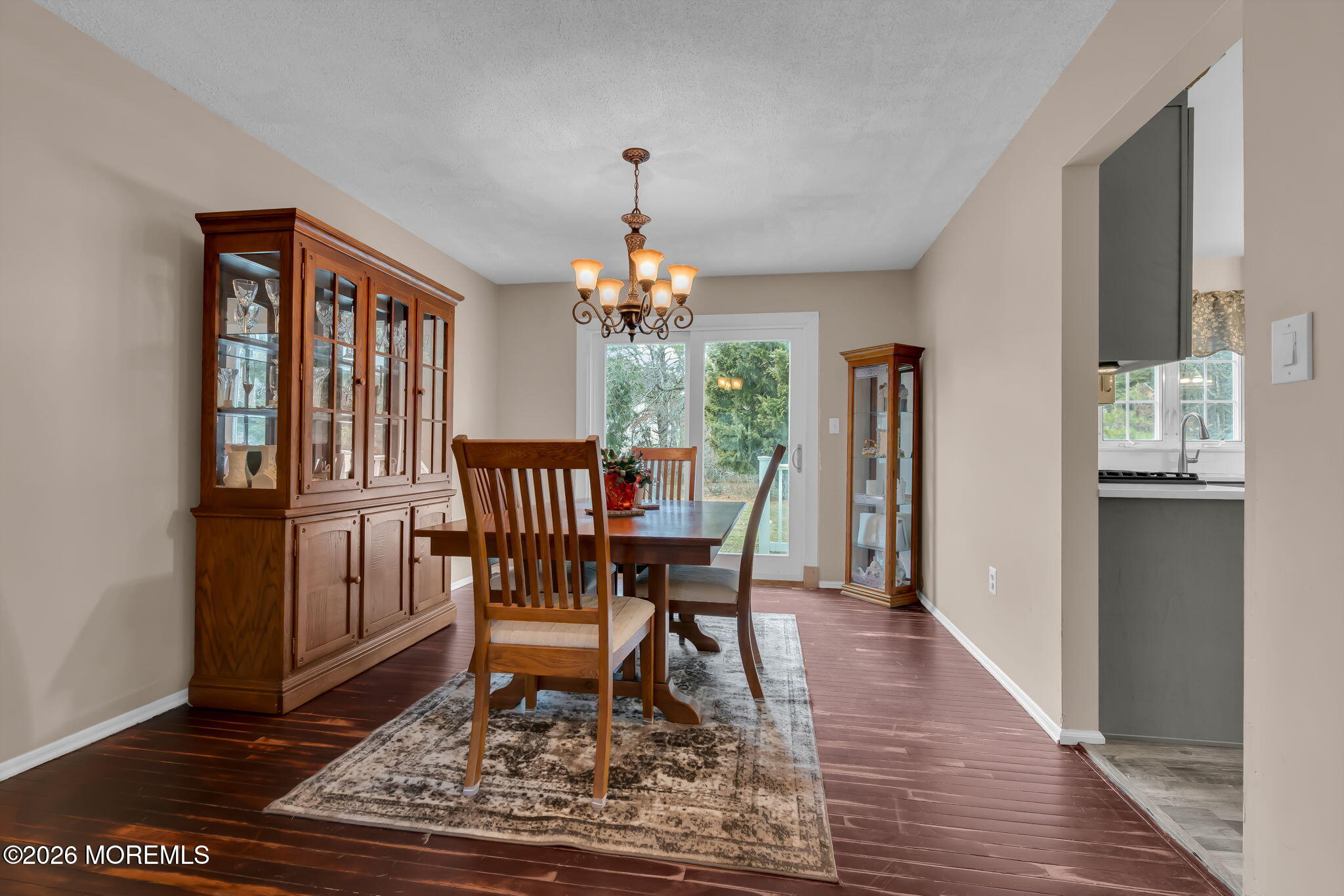 6 Candy Court Jackson, NJ 08527 - Photo 43 of 74 a view of a dining room with furniture window and wooden floor