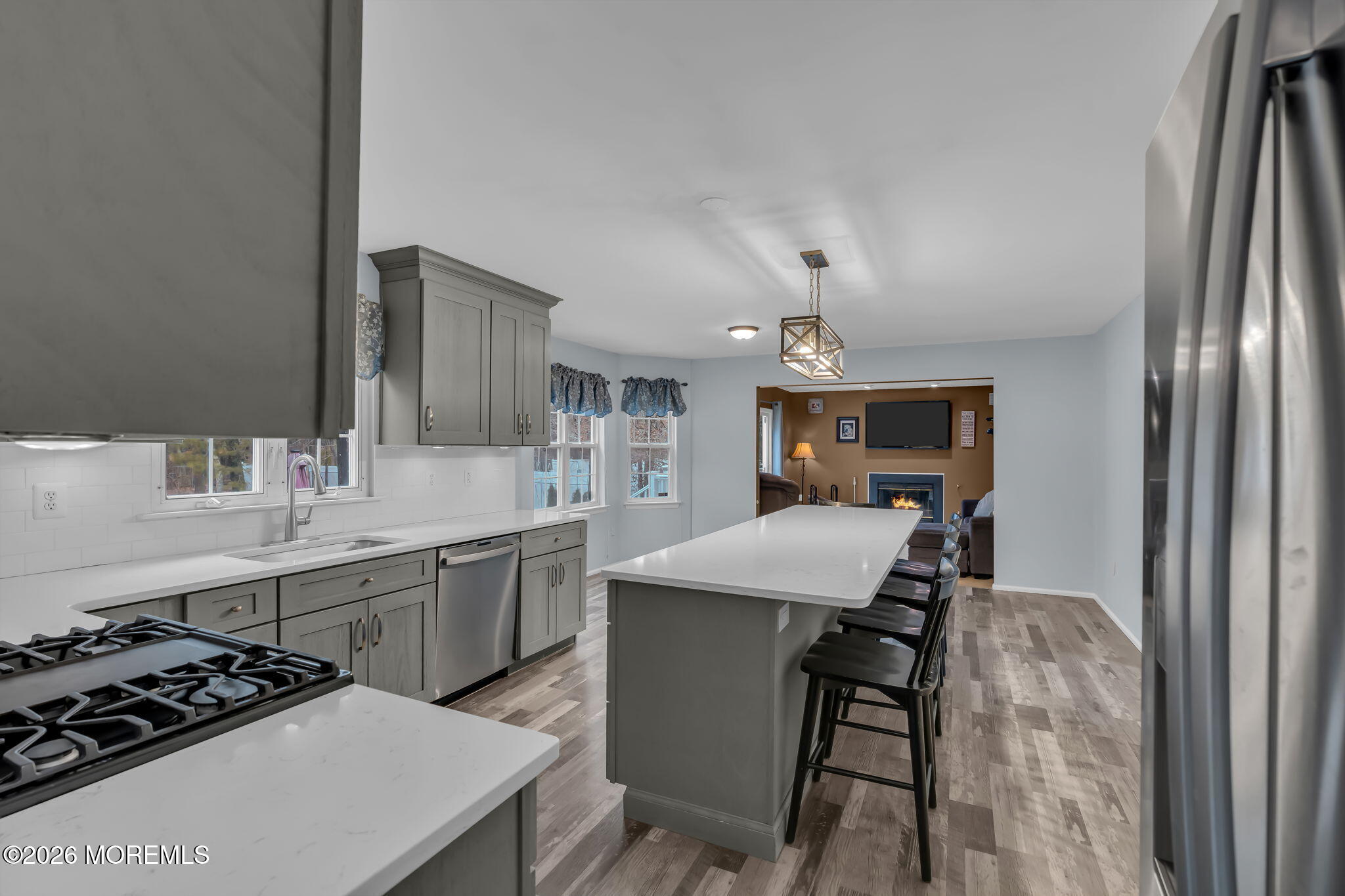 6 Candy Court Jackson, NJ 08527 - Photo 46 of 74 a kitchen with a table and chairs in it