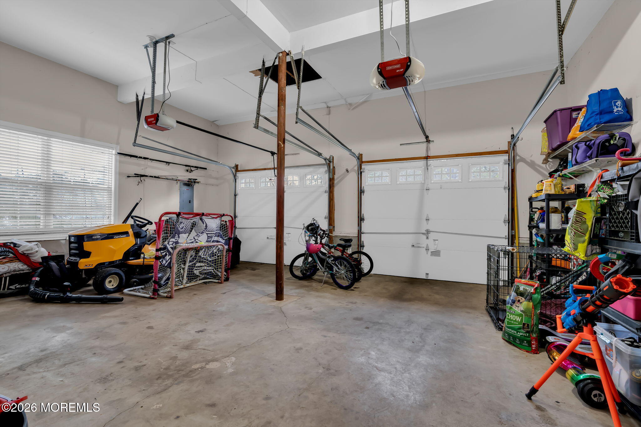 6 Candy Court Jackson, NJ 08527 - Photo 69 of 74 a view of a garage with a bike and storage