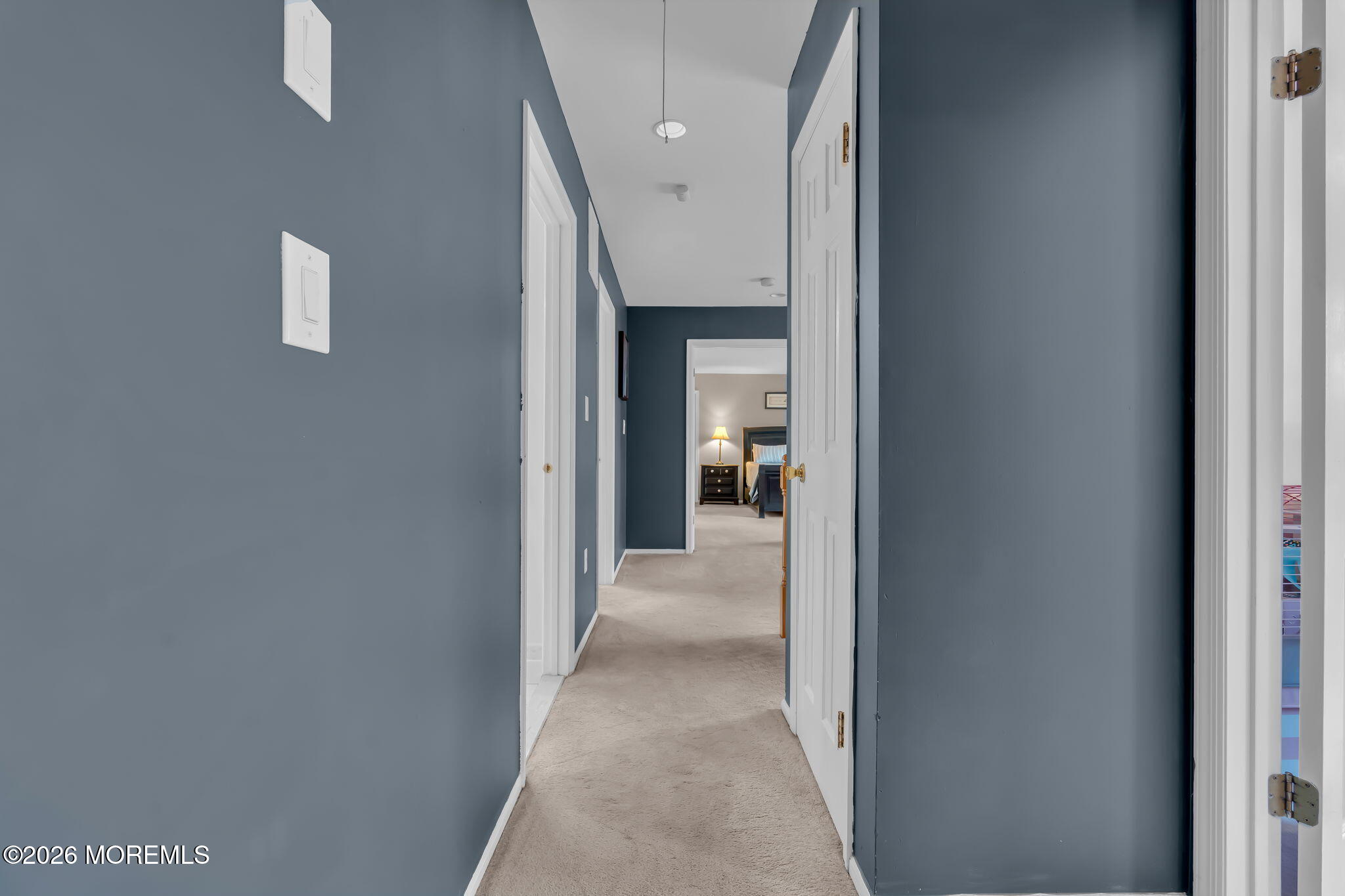 6 Candy Court Jackson, NJ 08527 - Photo 7 of 74 a view of a hallway with a livingroom and a bathroom with sink
