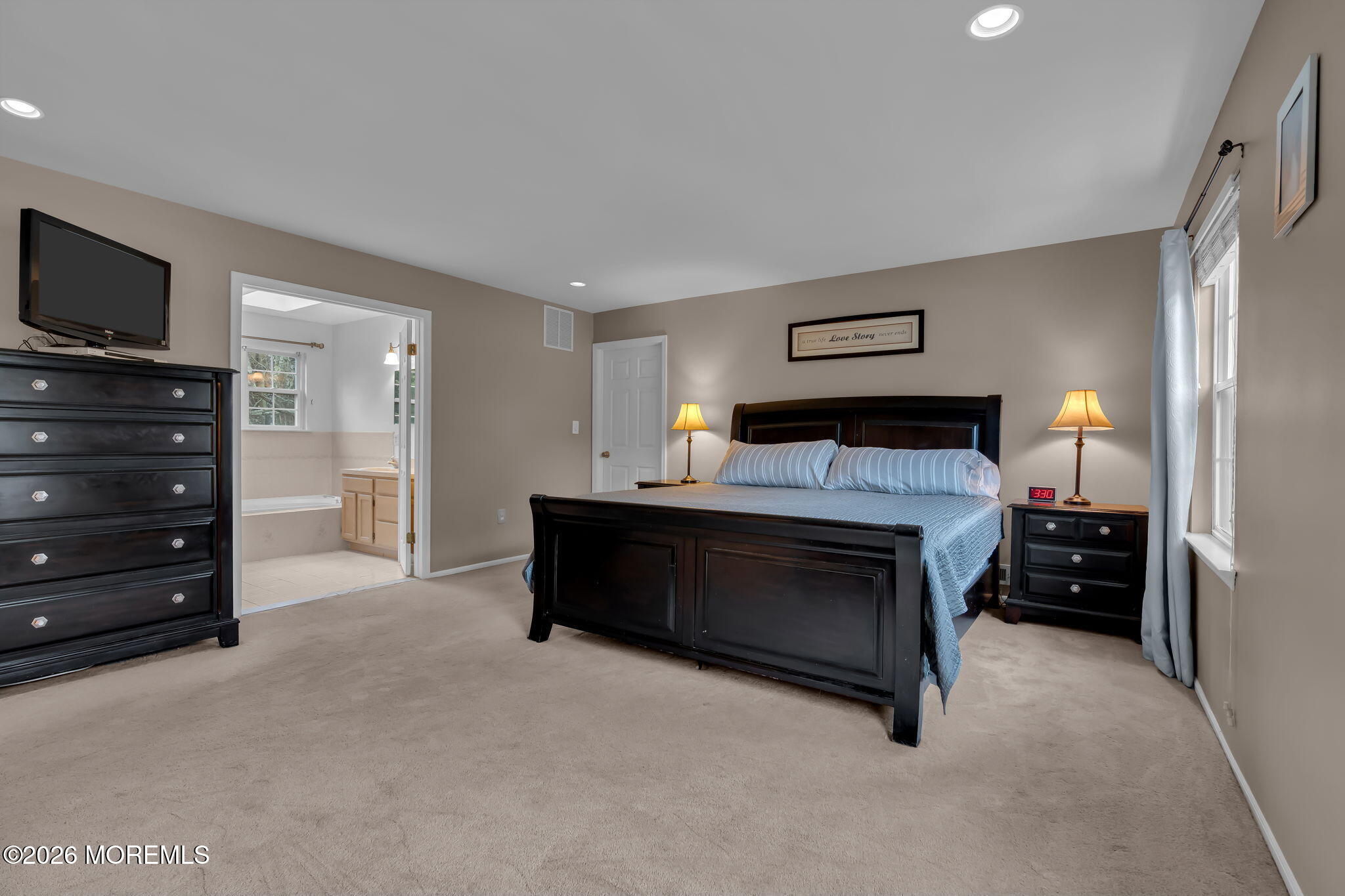 6 Candy Court Jackson, NJ 08527 - Photo 9 of 74 a bedroom with a bed and a television