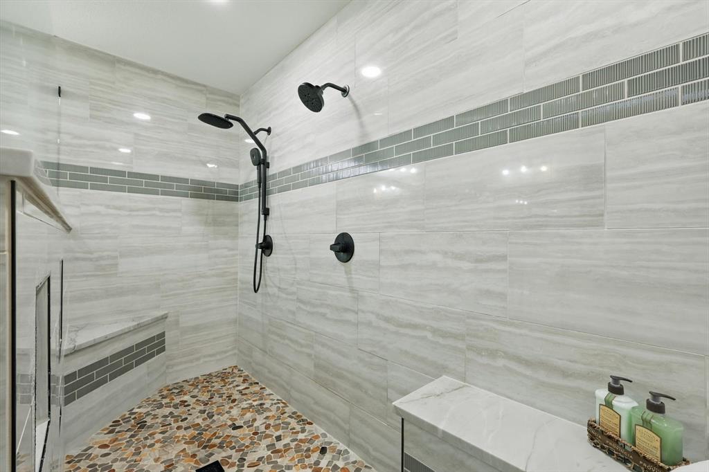 1904 Oak Ridge Trail Bridgeport, TX 76426 - Photo 21 of 34 Full bathroom with a tile shower and tile walls