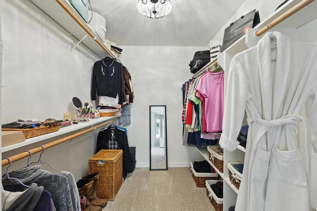 1904 Oak Ridge Trail Bridgeport, TX 76426 - Photo 22 of 34 Walk in closet featuring light colored carpet