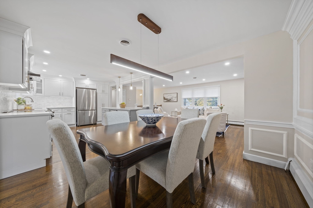 3 Burke Drive Canton, MA 02021 - Photo 14 of 39 a view of a dining room with furniture and wooden floor