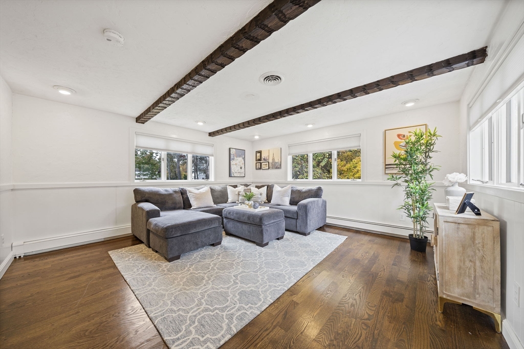 3 Burke Drive Canton, MA 02021 - Photo 17 of 39 a living room with furniture wooden floor and potted plant