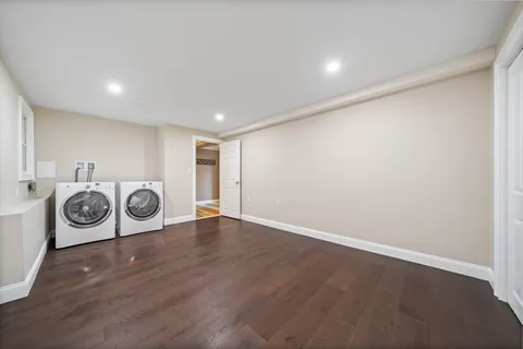 a view of a storage & utility room with washer and dryer