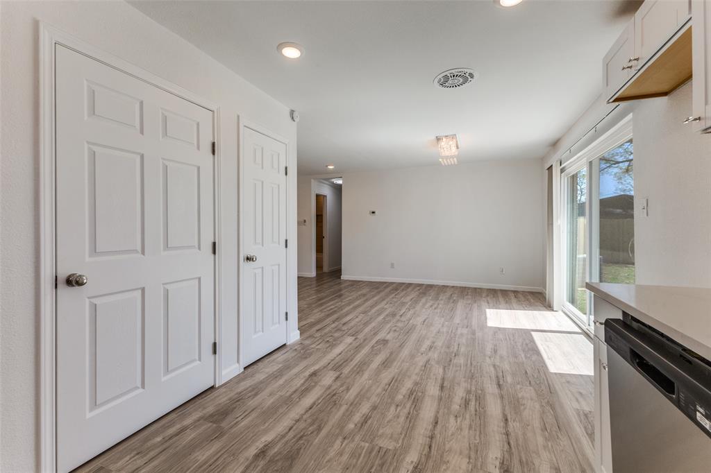 2950 Windmill Lane Farmers Branch, TX 75234 - Photo 12 of 25 a view of a hallway with wooden floor