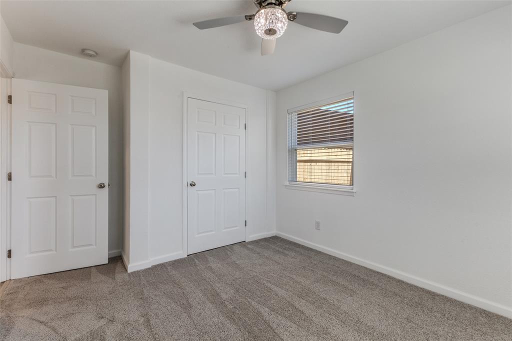 2950 Windmill Lane Farmers Branch, TX 75234 - Photo 17 of 25 a view of an empty room with a window