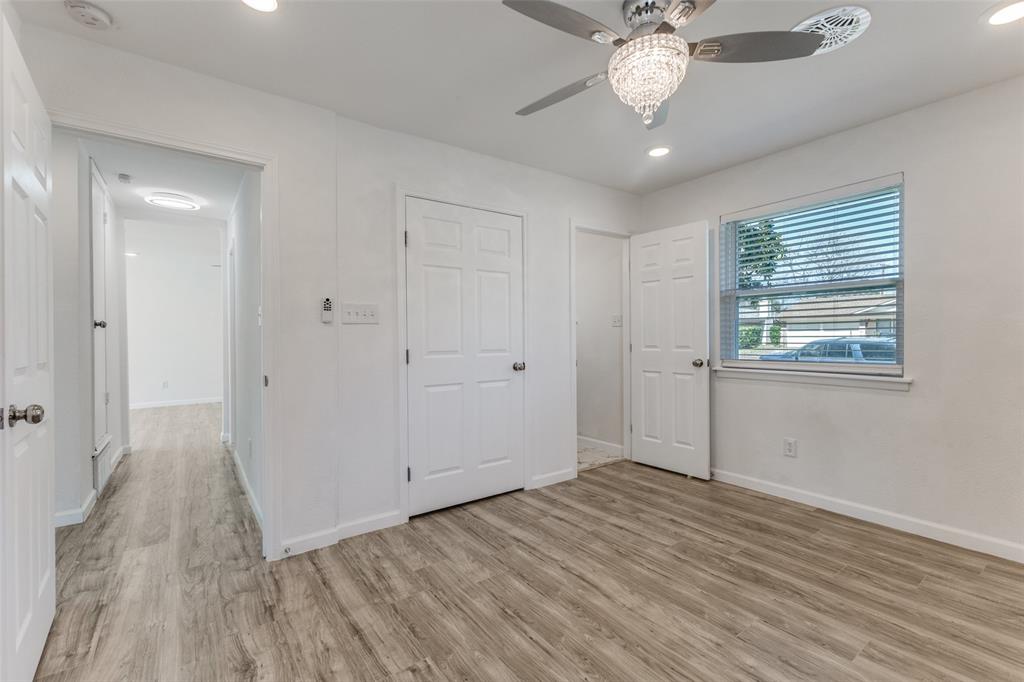 2950 Windmill Lane Farmers Branch, TX 75234 - Photo 19 of 25 a view of an empty room with a window