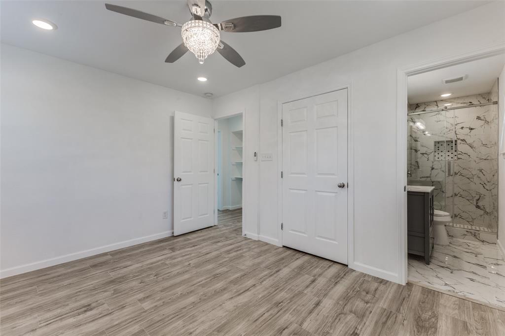 2950 Windmill Lane Farmers Branch, TX 75234 - Photo 20 of 25 an empty room with fan and entrance