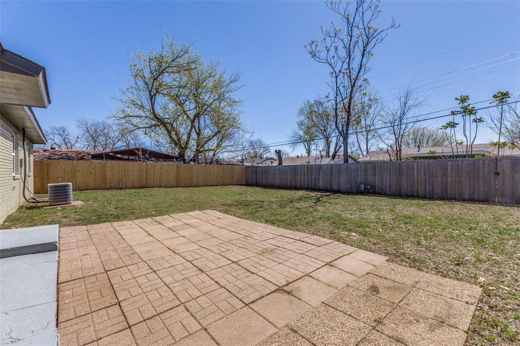 2950 Windmill Lane Farmers Branch, TX 75234 - Photo 23 of 25 a view of backyard with wooden fence
