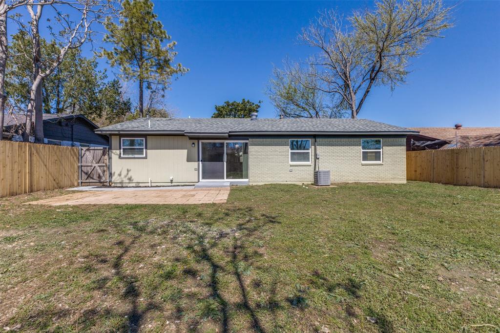 2950 Windmill Lane Farmers Branch, TX 75234 - Photo 24 of 25 a front view of a house with garden