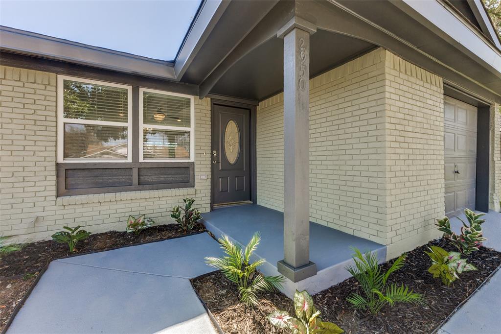2950 Windmill Lane Farmers Branch, TX 75234 - Photo 4 of 25 a view of a entryway door front of house