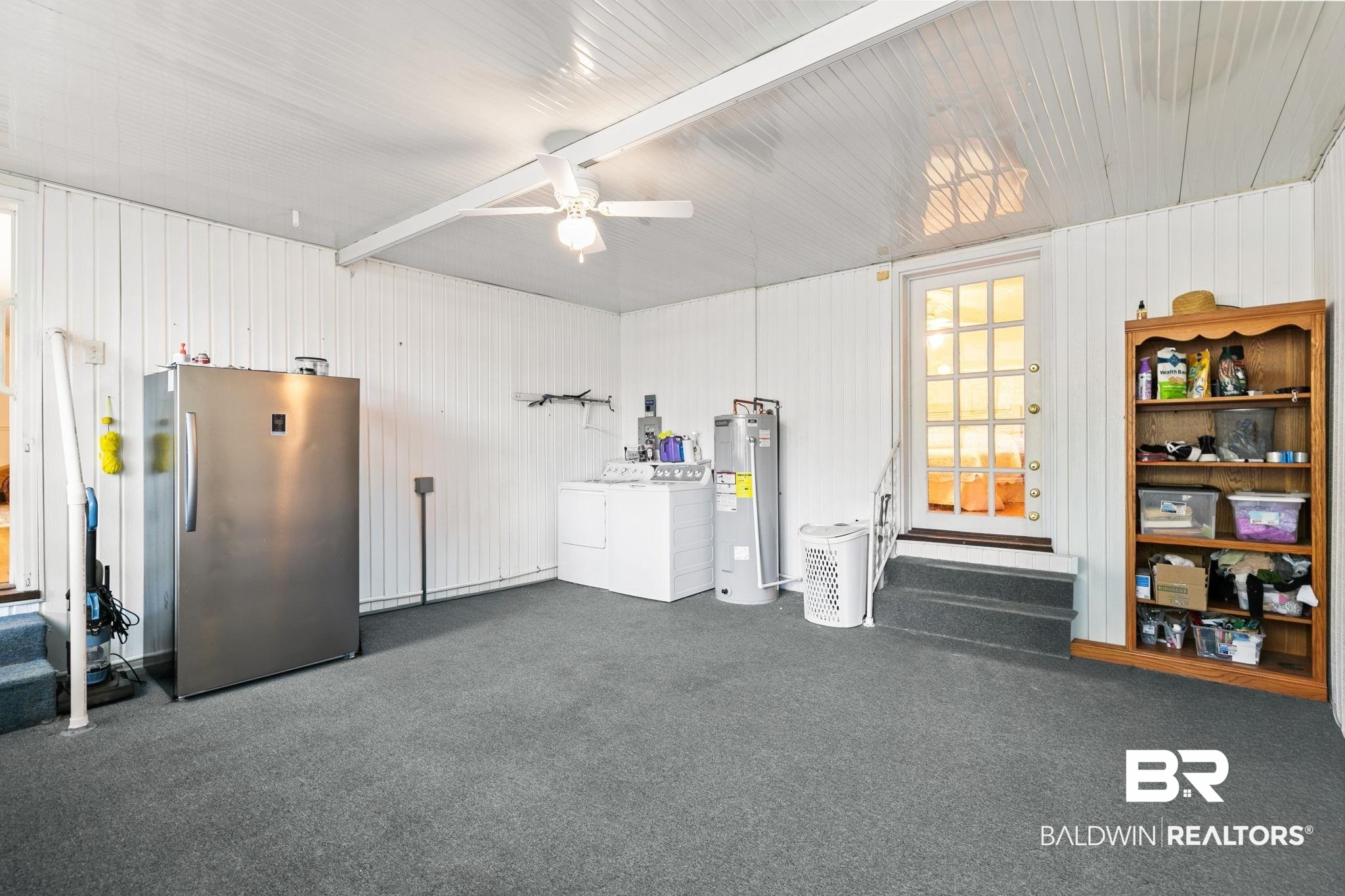 927 Cleveland Road Saraland, AL 36571 - Photo 37 of 80 Spacious utility room featuring white paneled walls and a matching ceiling with a ceiling fan