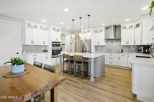 a view of a bathroom with washer and dryer