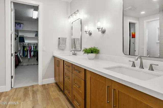 a bath tub sitting in a bathroom next to a shower