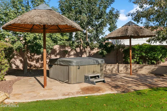 a view of a house with a yard porch and sitting area