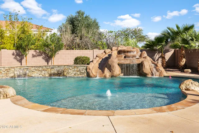 a dining room with garden view and a backyard