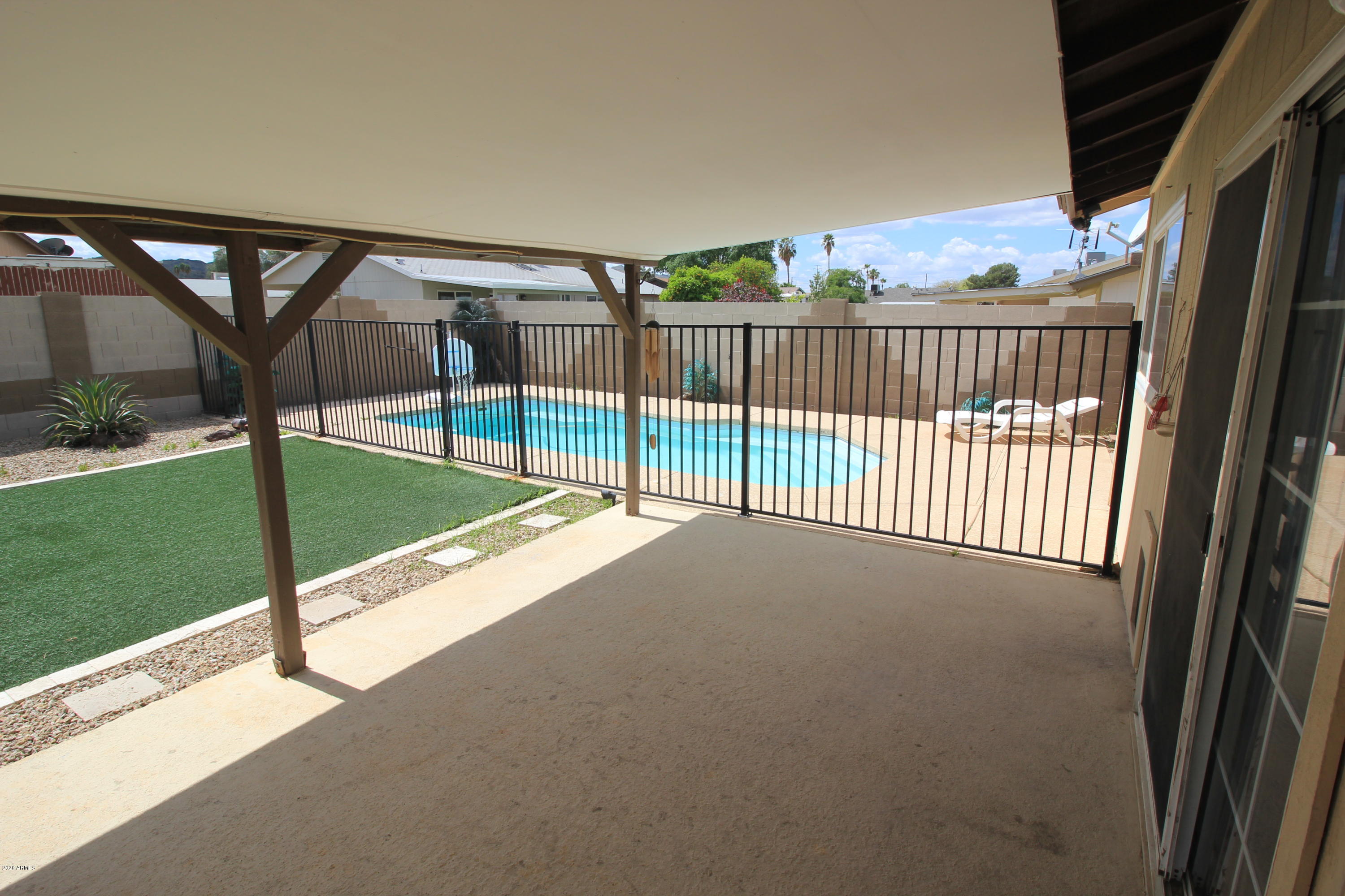 4723 East Carson Road Phoenix, AZ 85042 - Photo 7 of 23 BACKYARD AND FENCED POOL