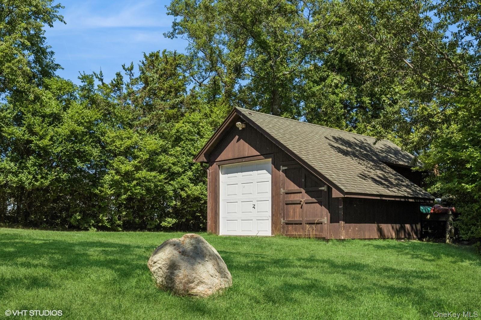 4630 Blue Horizon Bluffs Peconic, NY 11958 - Photo 12 of 13 a house view with a garden space