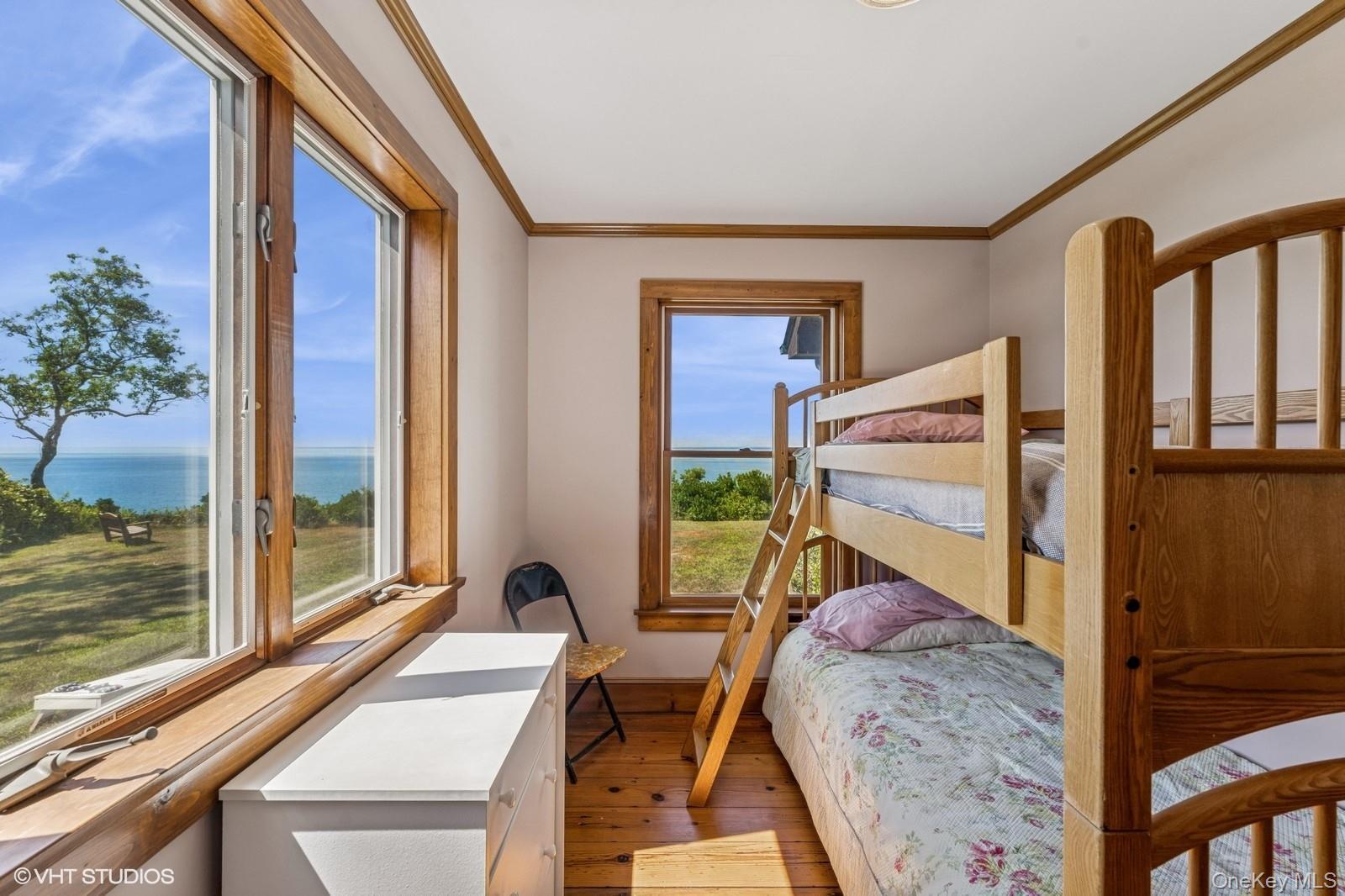 4630 Blue Horizon Bluffs Peconic, NY 11958 - Photo 6 of 13 a view of a balcony with chairs