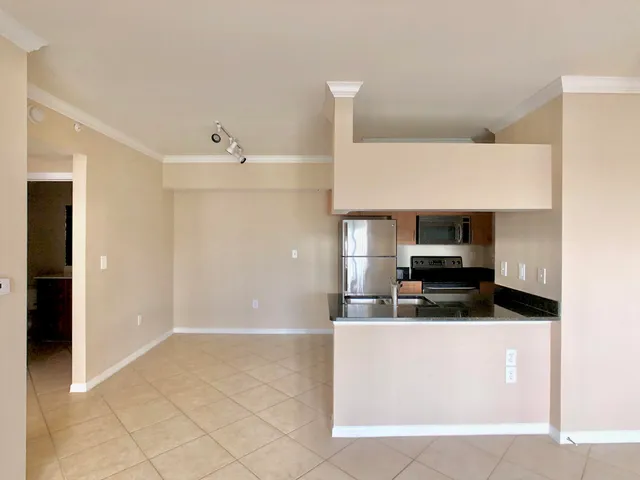 $225,000 | 6466 Emerald Dunes Drive, Unit 203, West Palm Beach, FL 33411