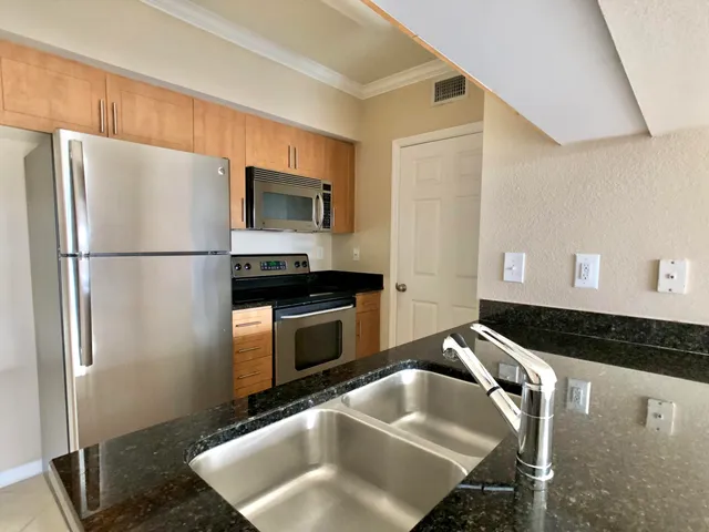 $225,000 | 6466 Emerald Dunes Drive, Unit 203, West Palm Beach, FL 33411