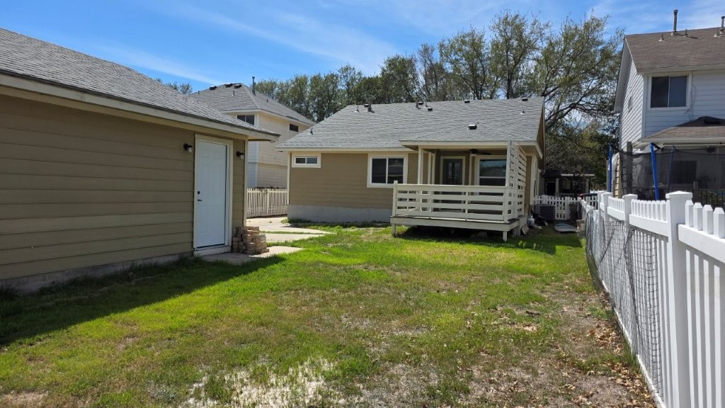 4700 Mather Kyle, TX 78640 - Photo 23 of 27 a front view of a house with a garden