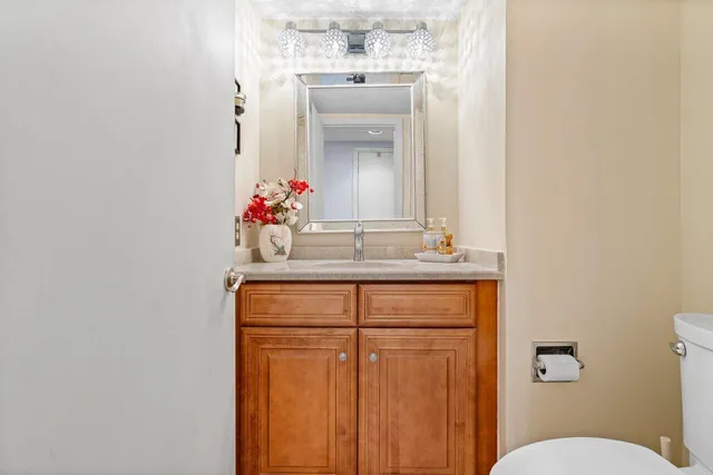 a utility room with sink dryer and washer