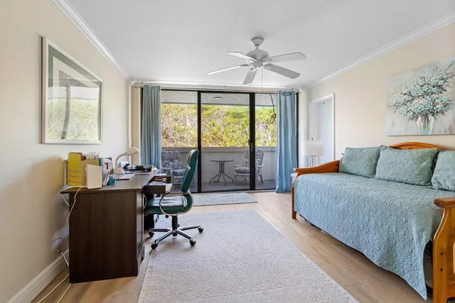 a bathroom with a granite countertop sink mirror and shower