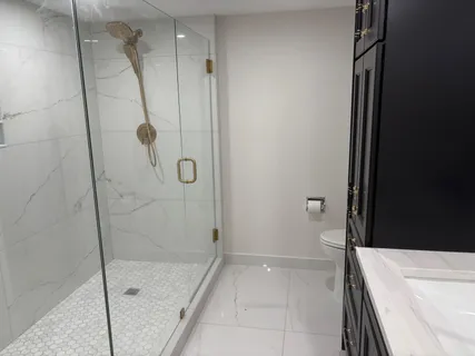 a white bath tub sitting in a bathroom