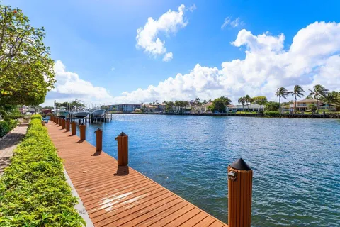 a view of a swimming pool with a lake view