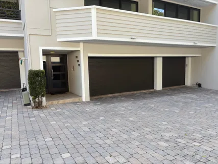 a view of entryway with a flower pot and a table in it