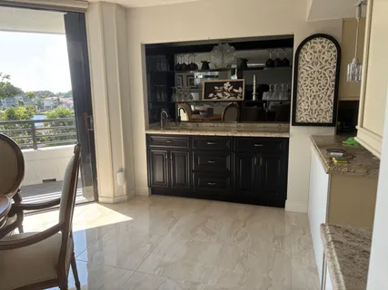 a living room with a couch and a flat screen tv