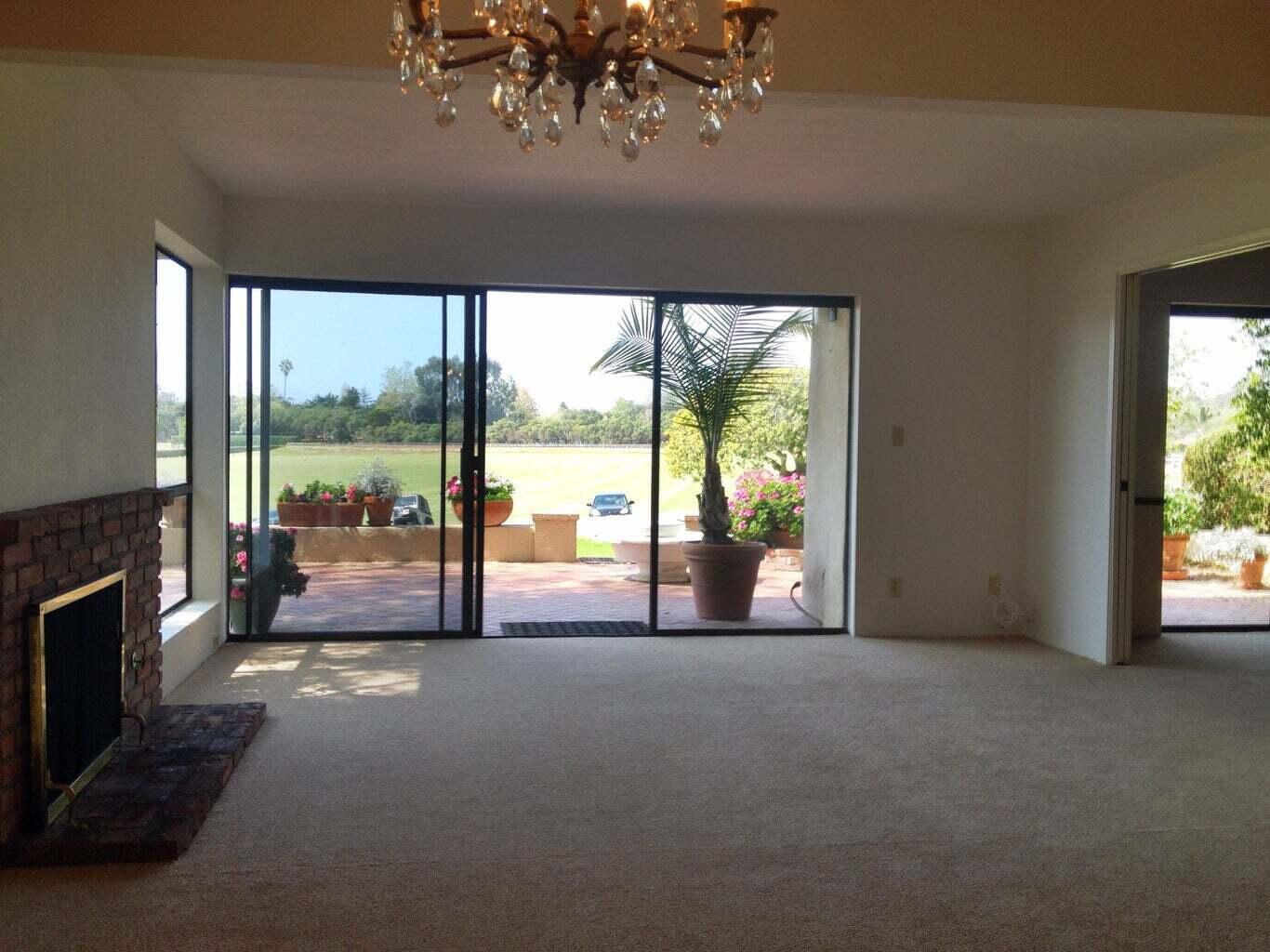 3375 Foothill Road, Unit 1011 Carpinteria, CA 93013 - Photo 2 of 6 a view of empty room with floor to ceiling window