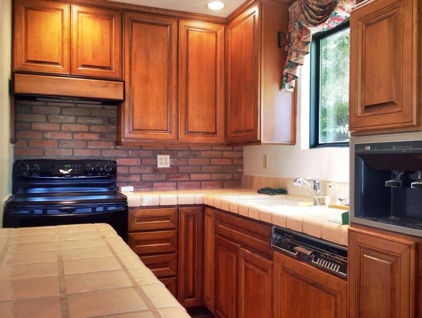 3375 Foothill Road, Unit 1011 Carpinteria, CA 93013 - Photo 6 of 6 a kitchen with a cabinets and appliances