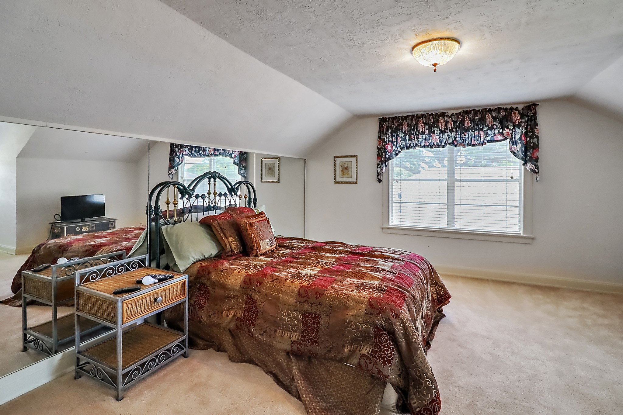 405 Park Street Anahuac, TX 77514 - Photo 26 of 37 This bedroom is on the west side upstairs.