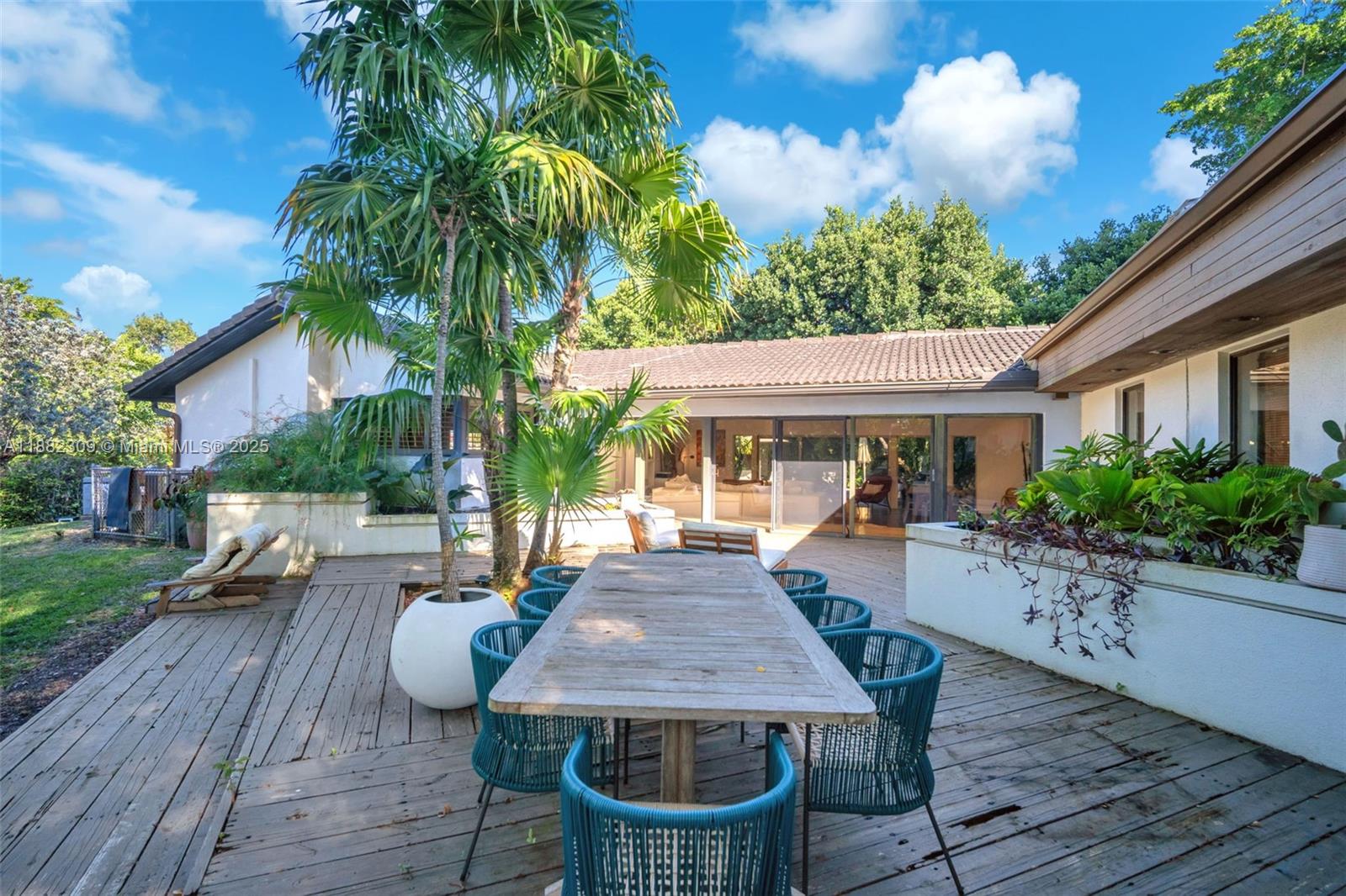 4401 Sanders Street Hollywood, FL 33021 - Photo 23 of 71 a view of a house with backyard and sitting area