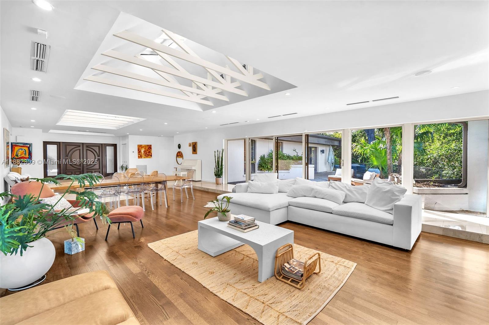 4401 Sanders Street Hollywood, FL 33021 - Photo 3 of 71 a living room with furniture and a large window