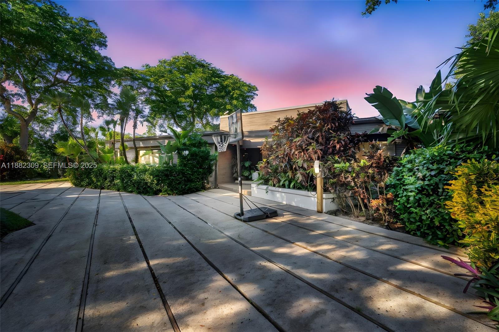 4401 Sanders Street Hollywood, FL 33021 - Photo 32 of 71 a view of a pathway with a yard