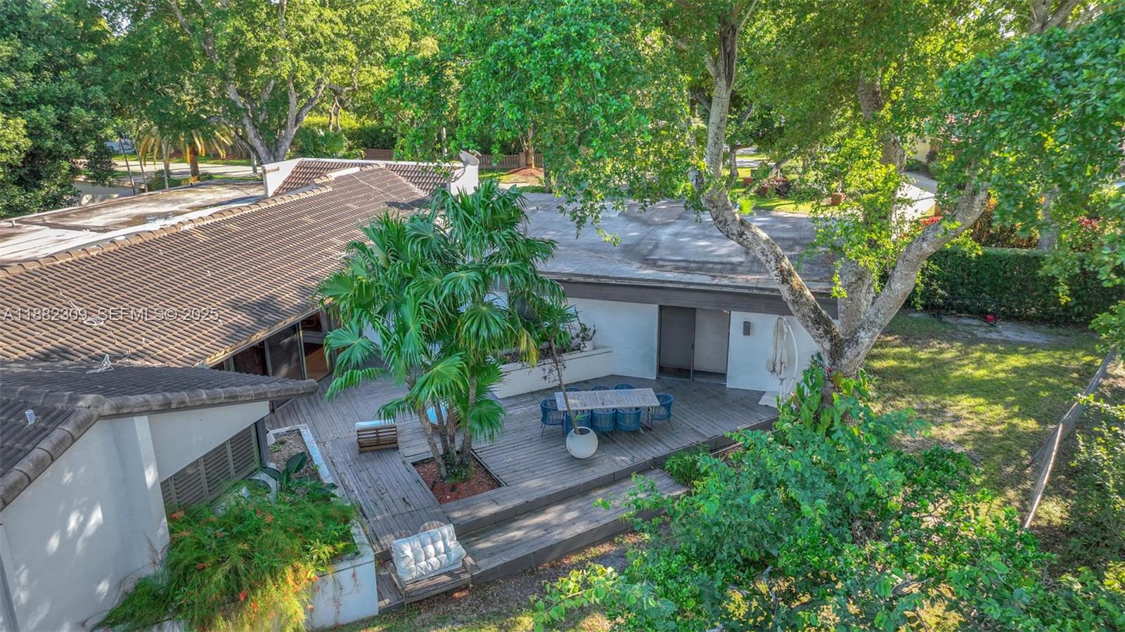 4401 Sanders Street Hollywood, FL 33021 - Photo 44 of 71 an aerial view of a house with garden space and a patio