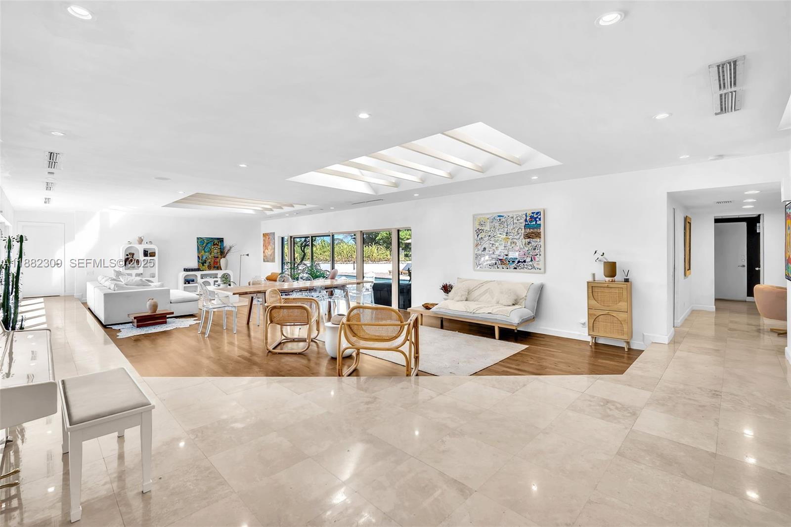 4401 Sanders Street Hollywood, FL 33021 - Photo 45 of 71 a living room with furniture and a table