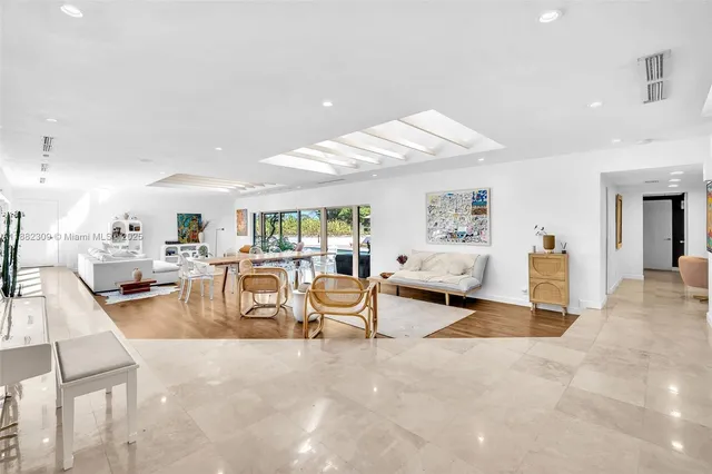 a view of swimming pool with seating space