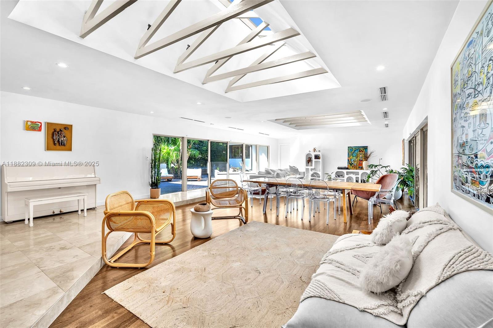 4401 Sanders Street Hollywood, FL 33021 - Photo 47 of 71 a living room with furniture and a large window