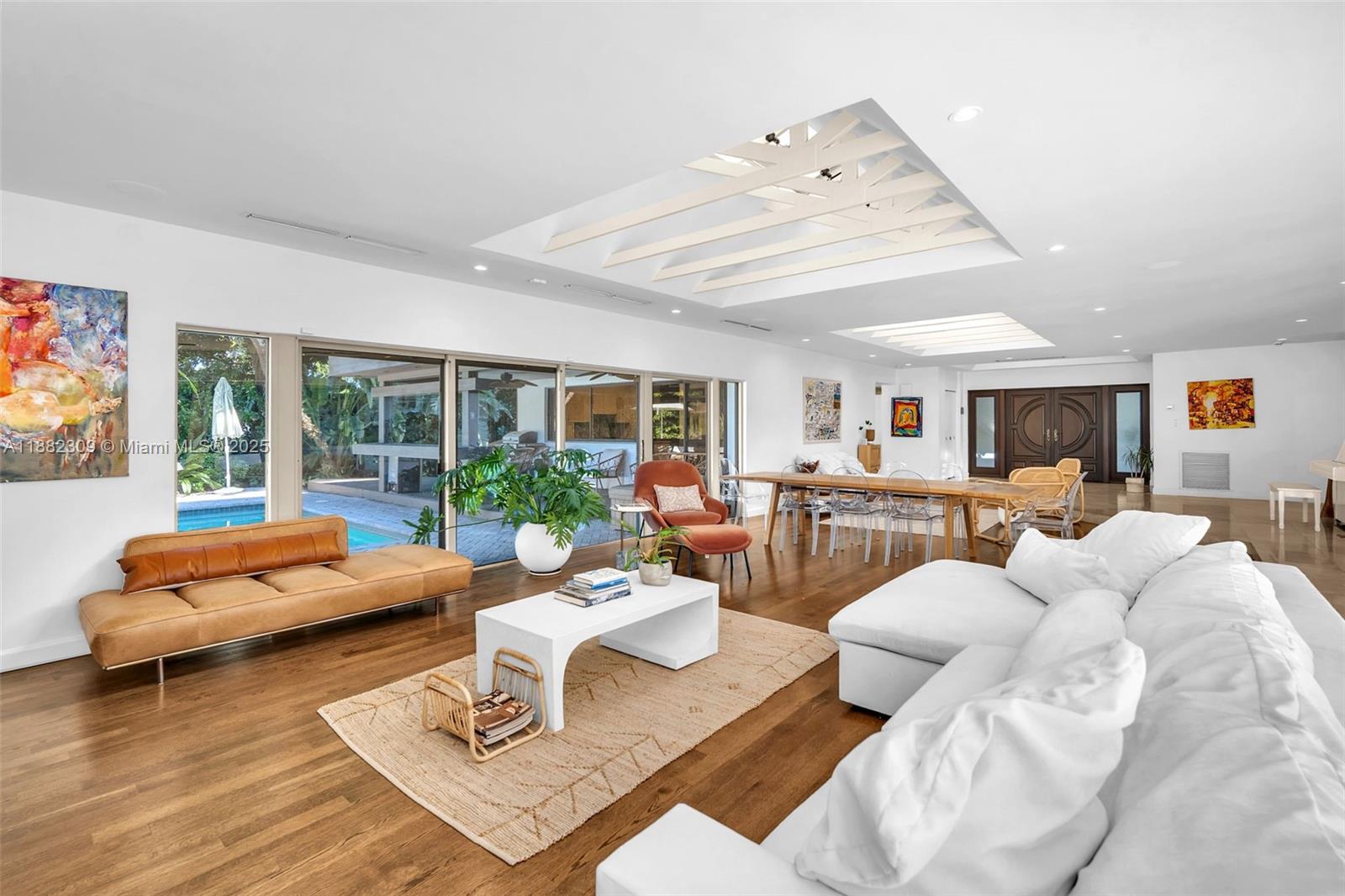 4401 Sanders Street Hollywood, FL 33021 - Photo 49 of 71 a living room with furniture and a large window