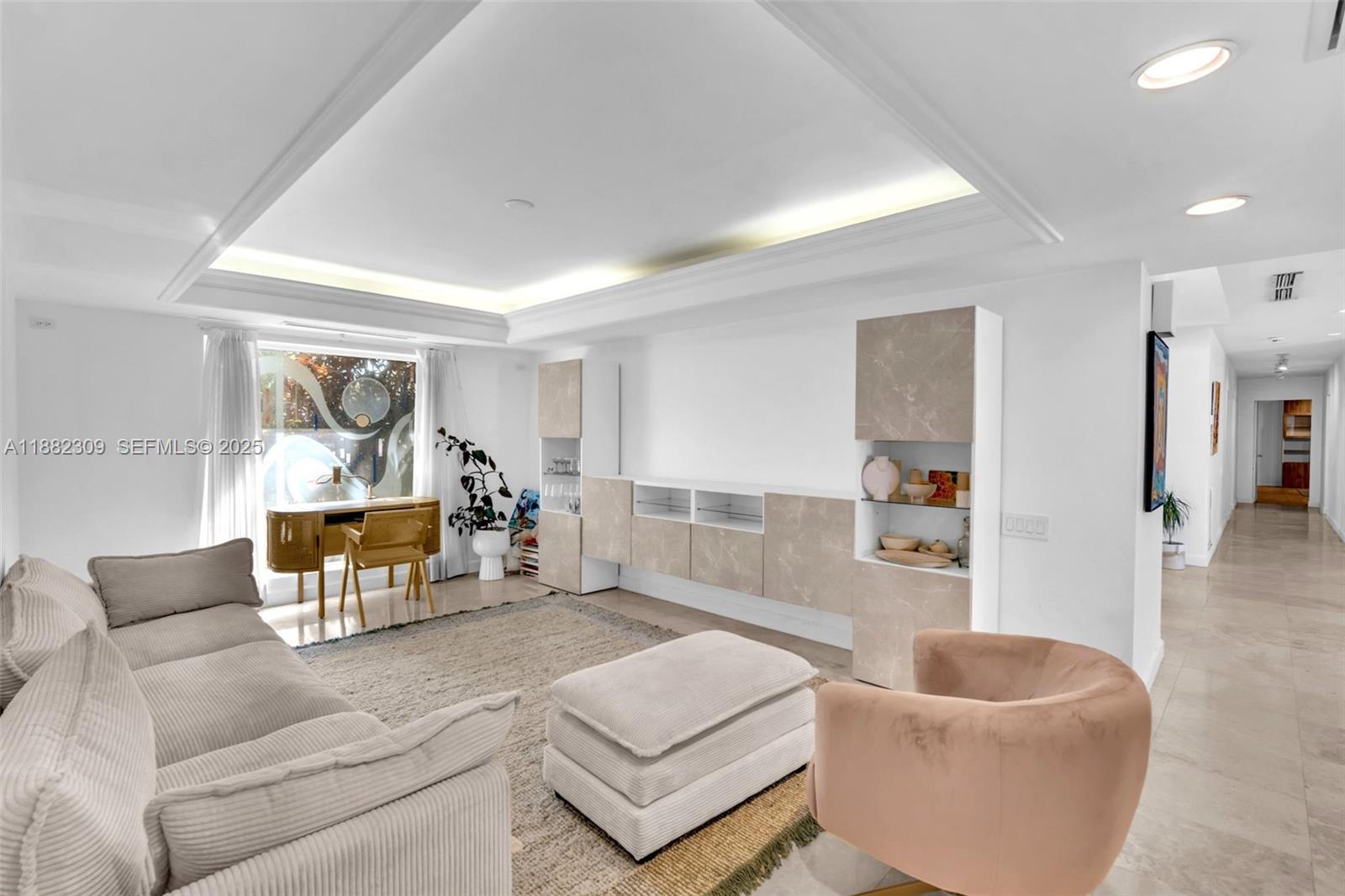 4401 Sanders Street Hollywood, FL 33021 - Photo 5 of 71 a living room with furniture and a potted plant