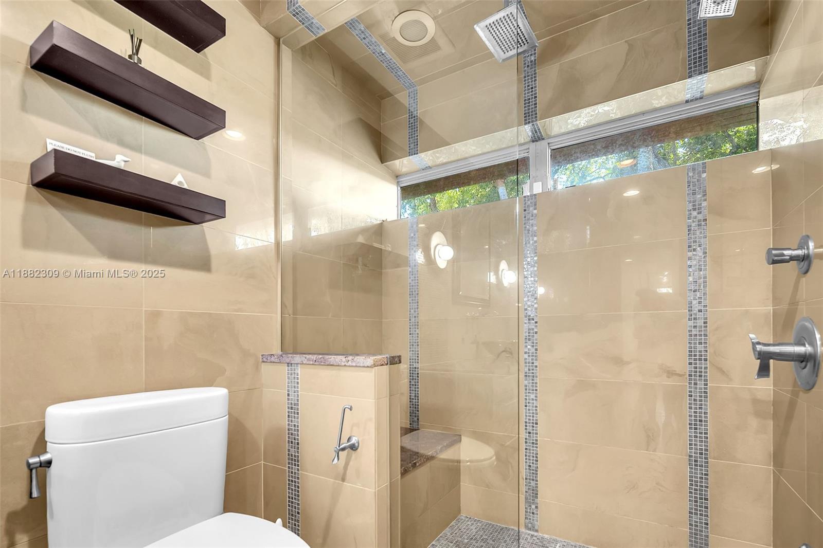 4401 Sanders Street Hollywood, FL 33021 - Photo 67 of 71 a bathroom with a shower and toilet